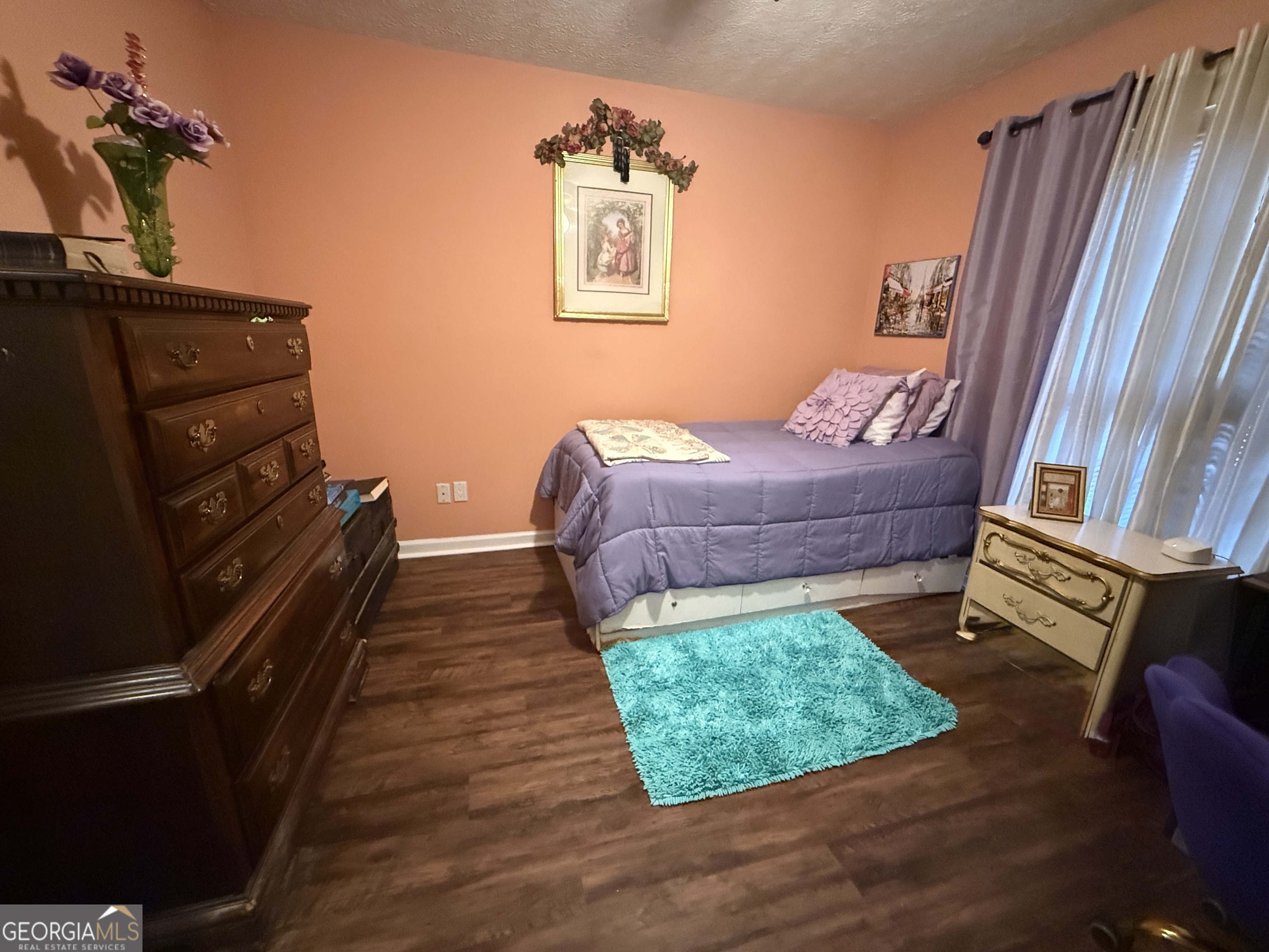 104 Monte Place Cordele, GA 31015 - Photo 27 of 52 a bed room with a bed and a window