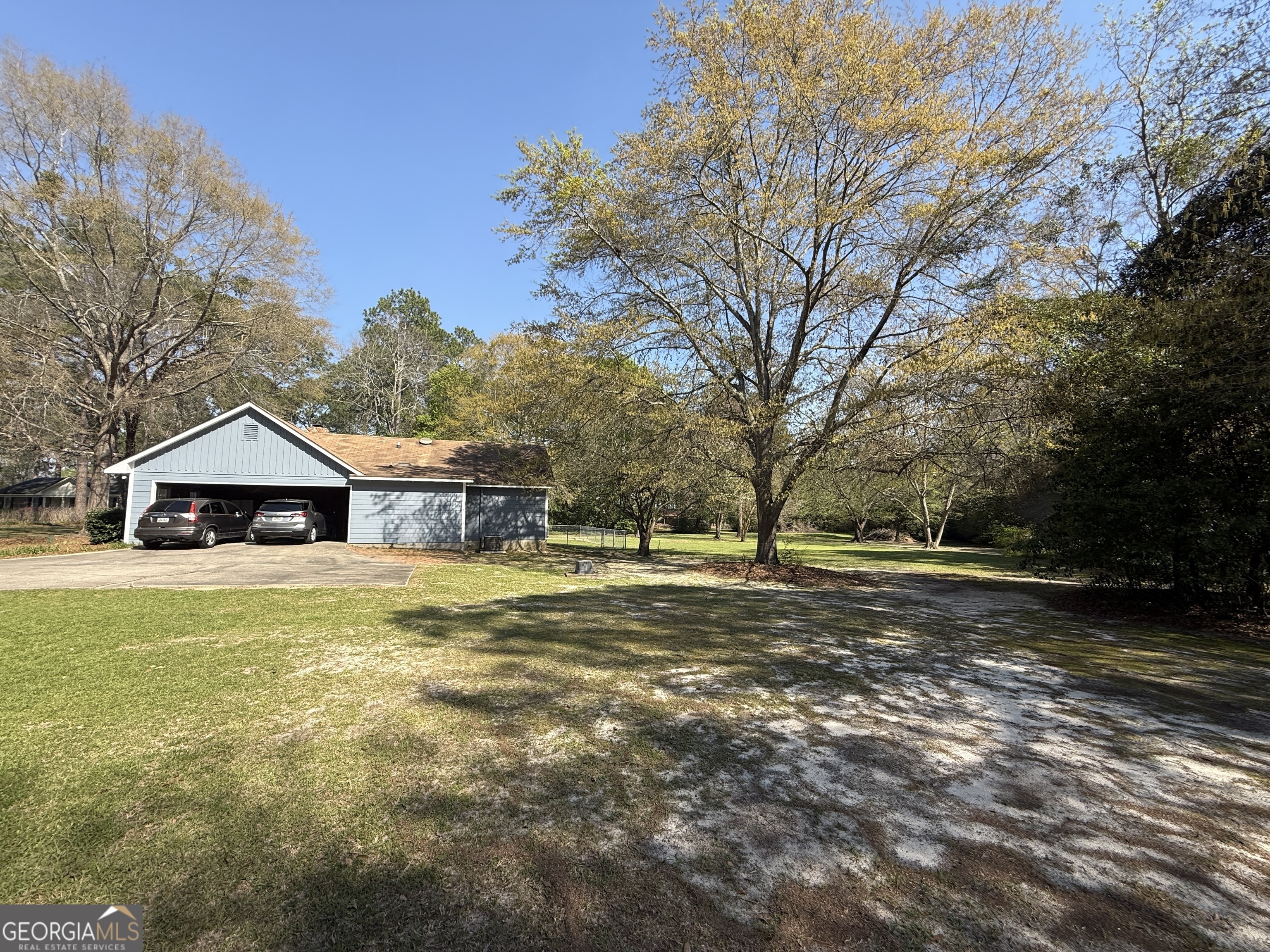 104 Monte Place Cordele, GA 31015 - Photo 4 of 52 a view of a house with a yard