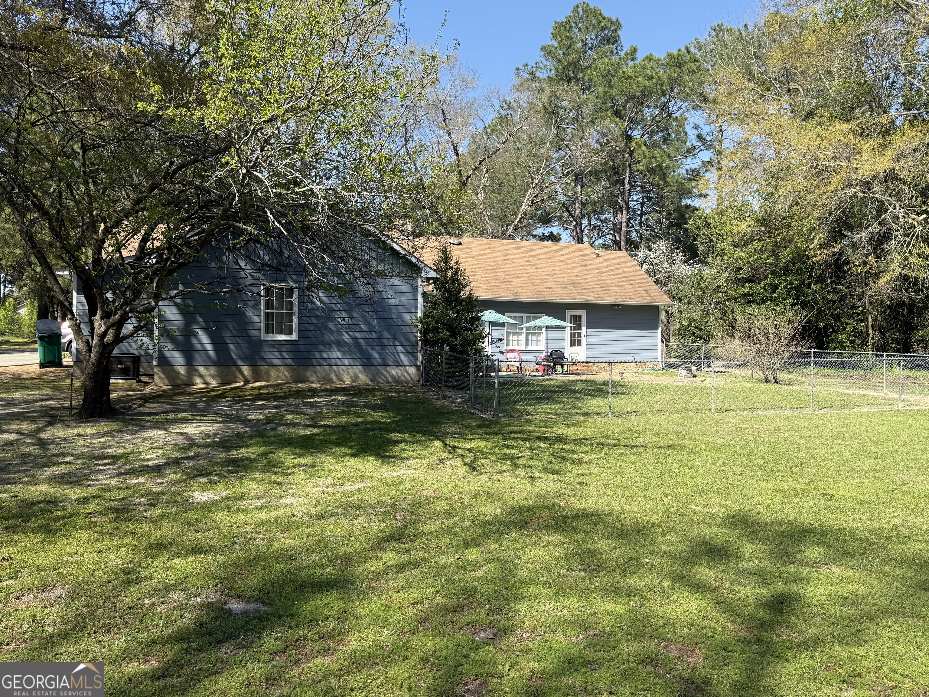 104 Monte Place Cordele, GA 31015 - Photo 44 of 52 a front view of house with yard and trees