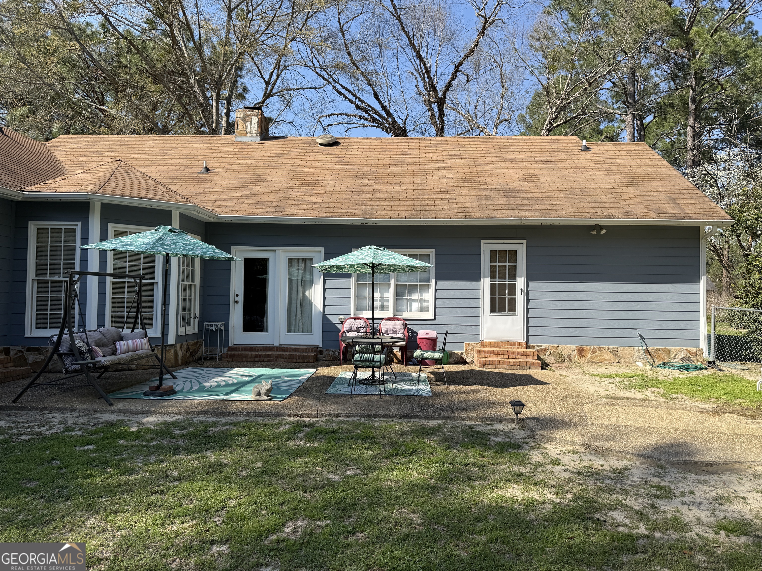 104 Monte Place Cordele, GA 31015 - Photo 45 of 52 a backyard of a house with seating space