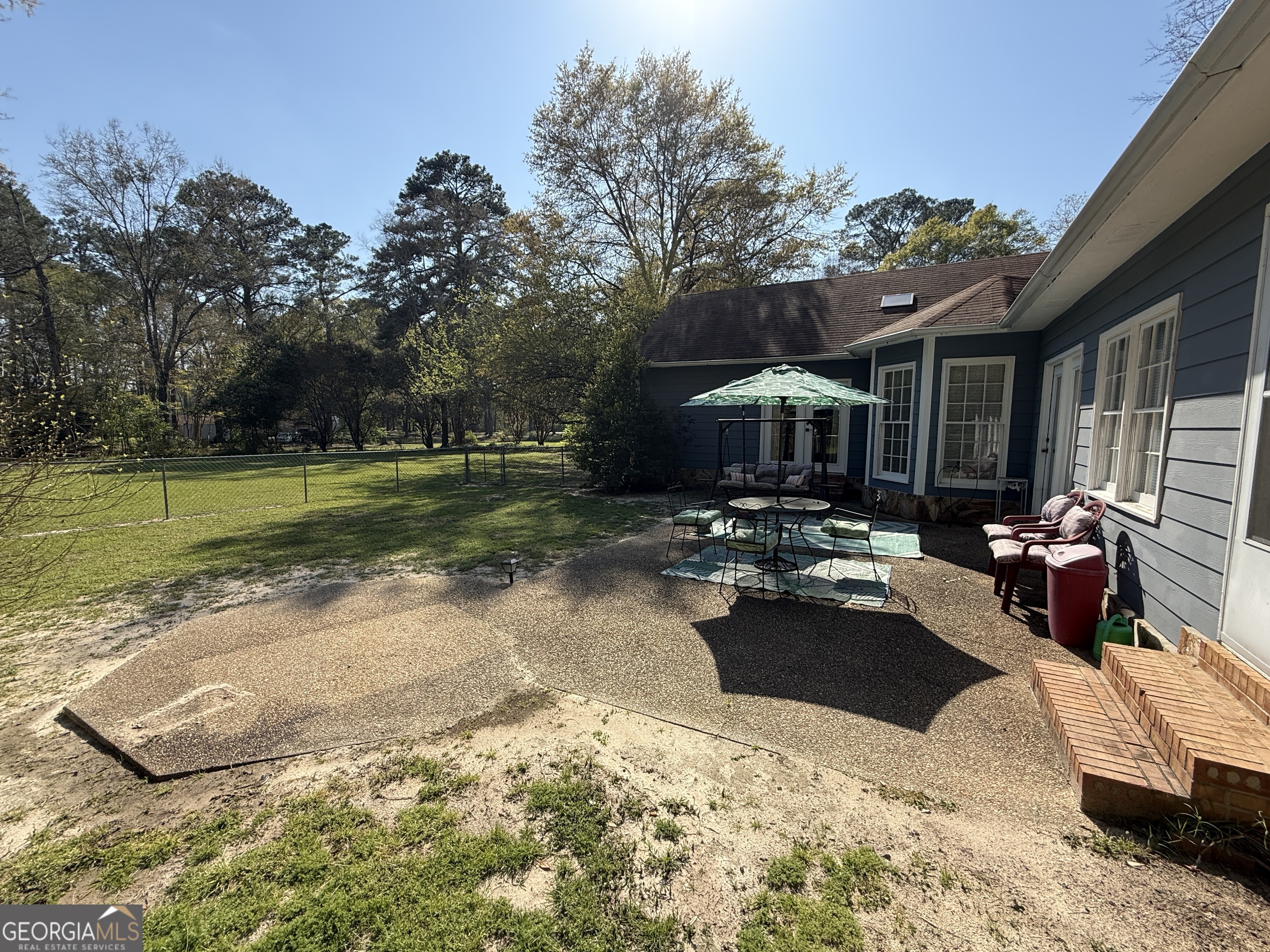 104 Monte Place Cordele, GA 31015 - Photo 48 of 52 a view of a patio with swimming pool table and chairs