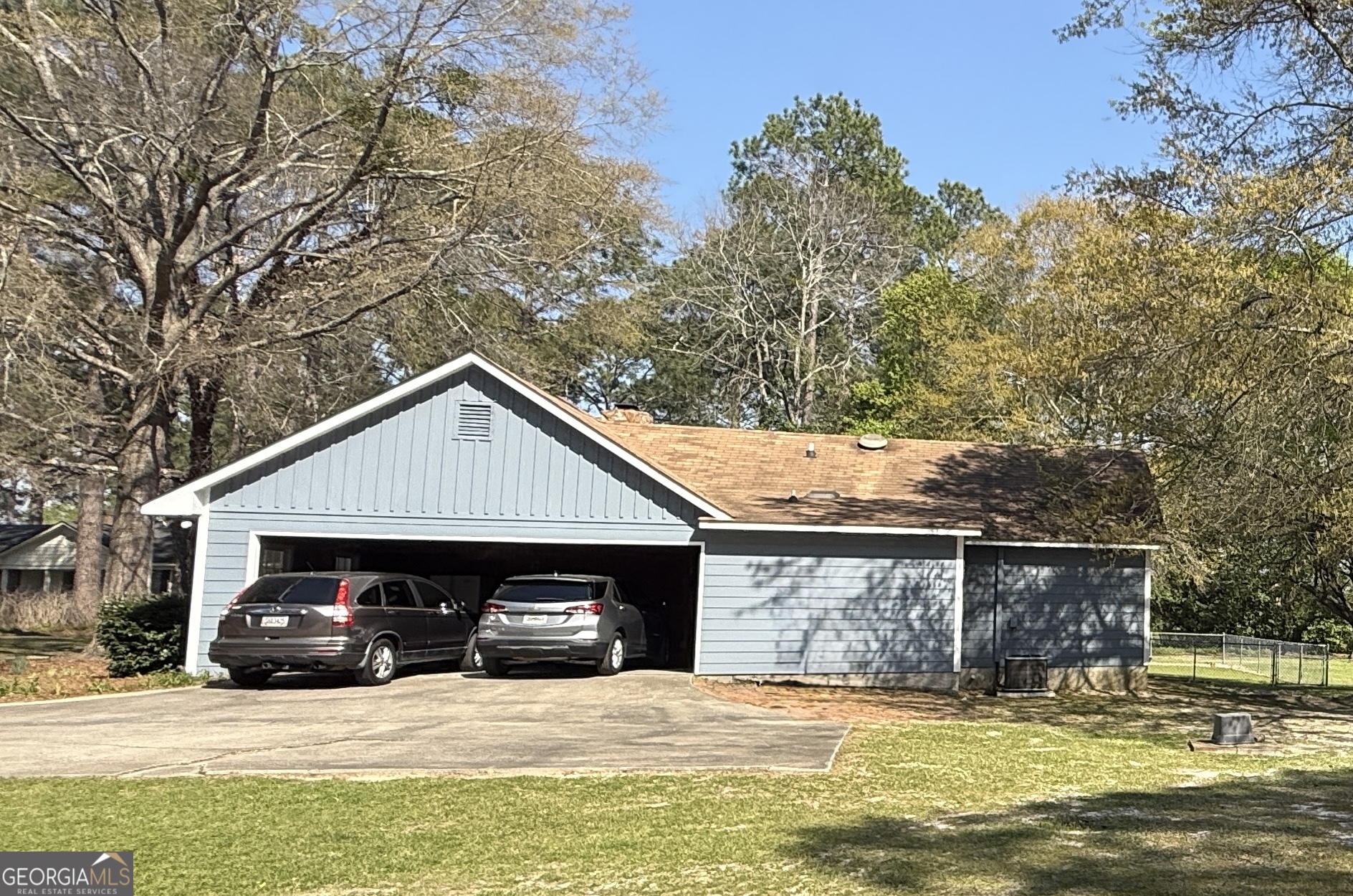 104 Monte Place Cordele, GA 31015 - Photo 5 of 52 a view of a house with a yard and roof deck