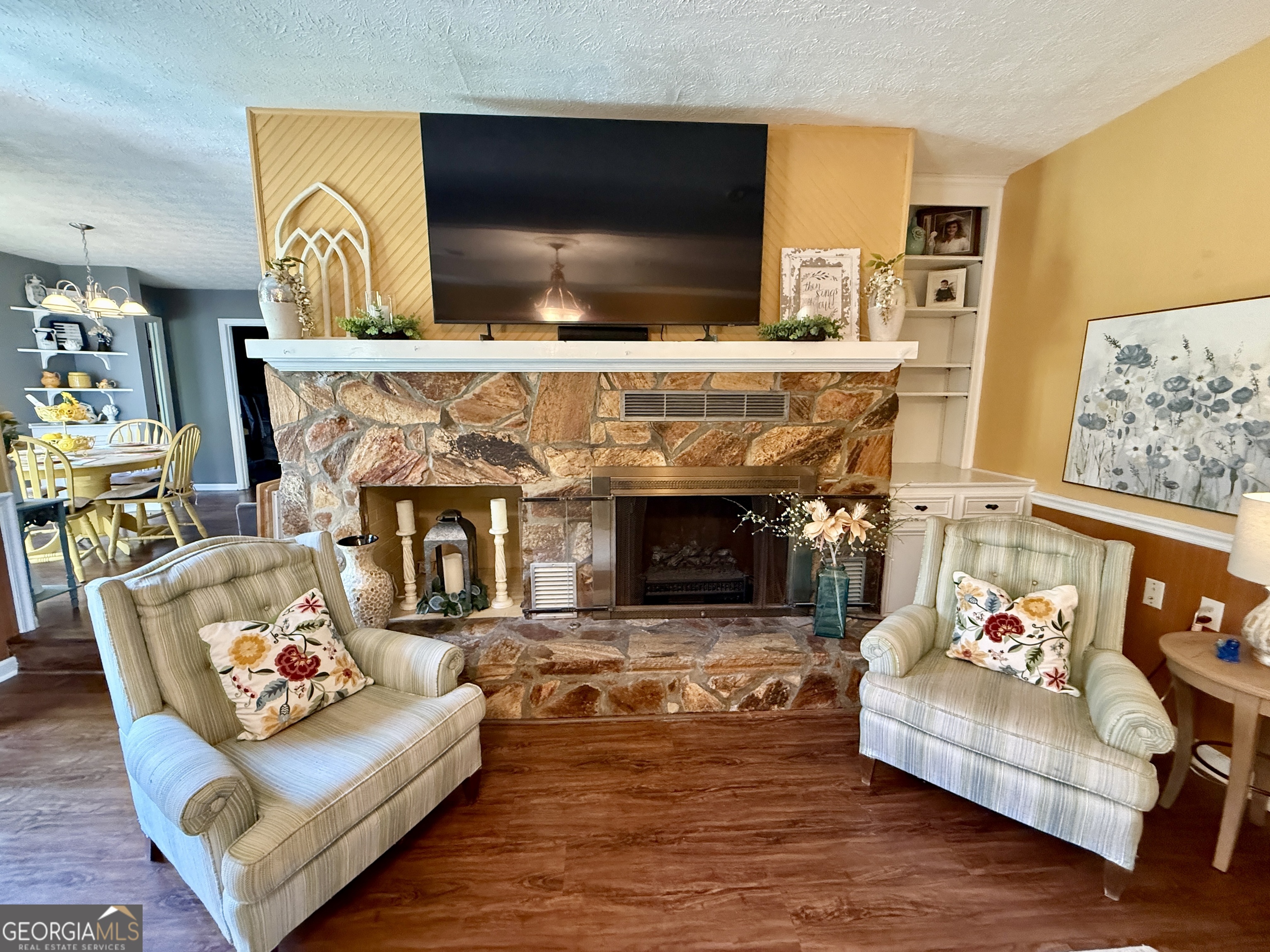 104 Monte Place Cordele, GA 31015 - Photo 8 of 52 a living room with furniture and a fireplace