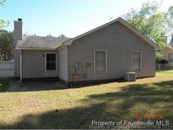 1132 Hoke Loop Road Fayetteville, NC 28314 - Photo 12 of 12 a view of a house with a yard