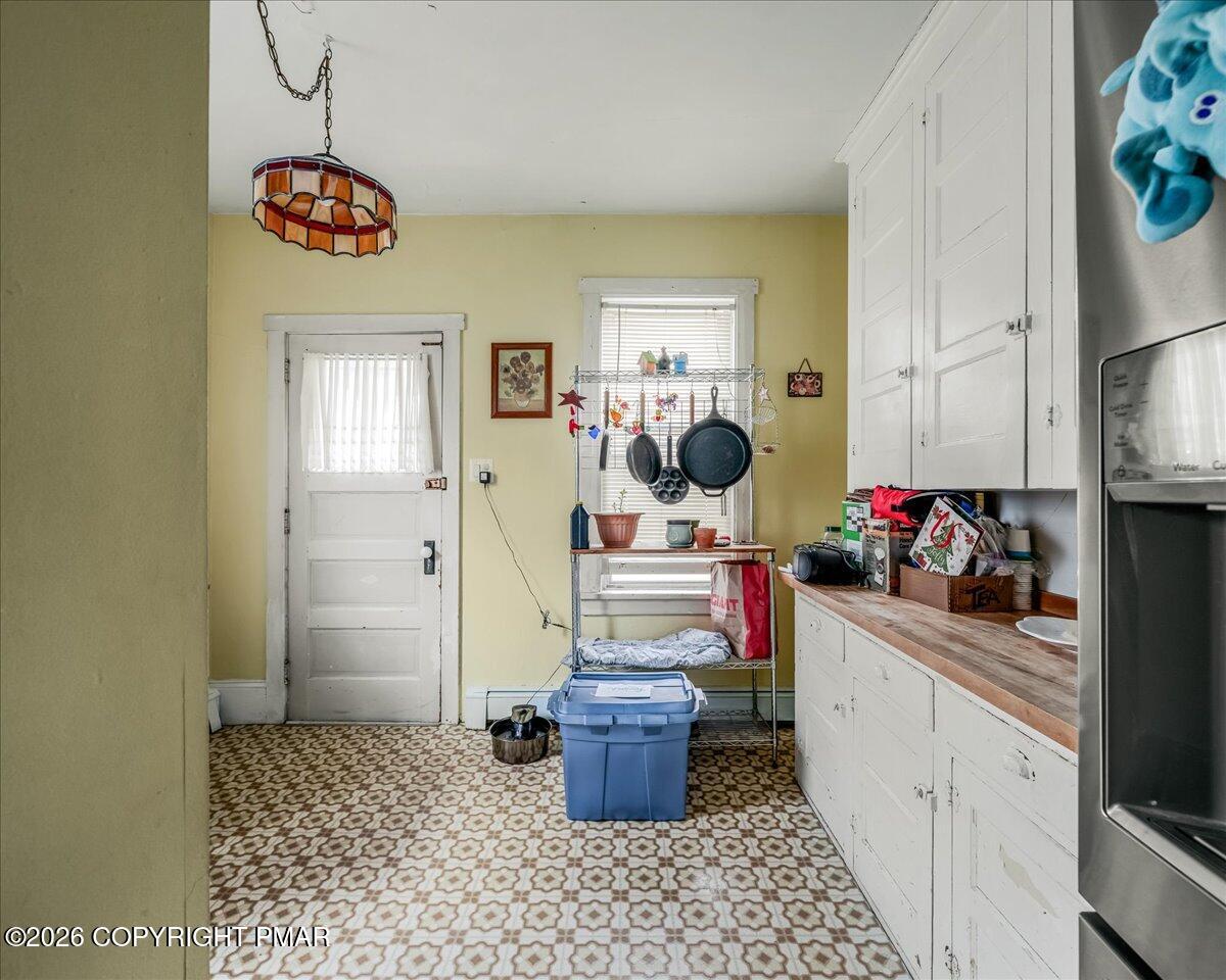 136 St George Street Lewisburg, PA 17837 - Photo 15 of 42 a kitchen with a stove and a refrigerator