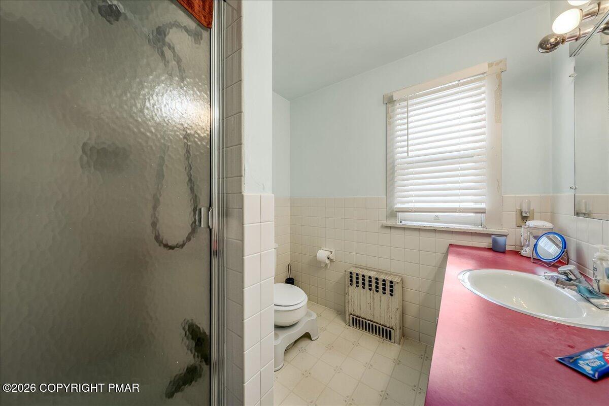 136 St George Street Lewisburg, PA 17837 - Photo 19 of 42 a bathroom with a sink toilet and shower