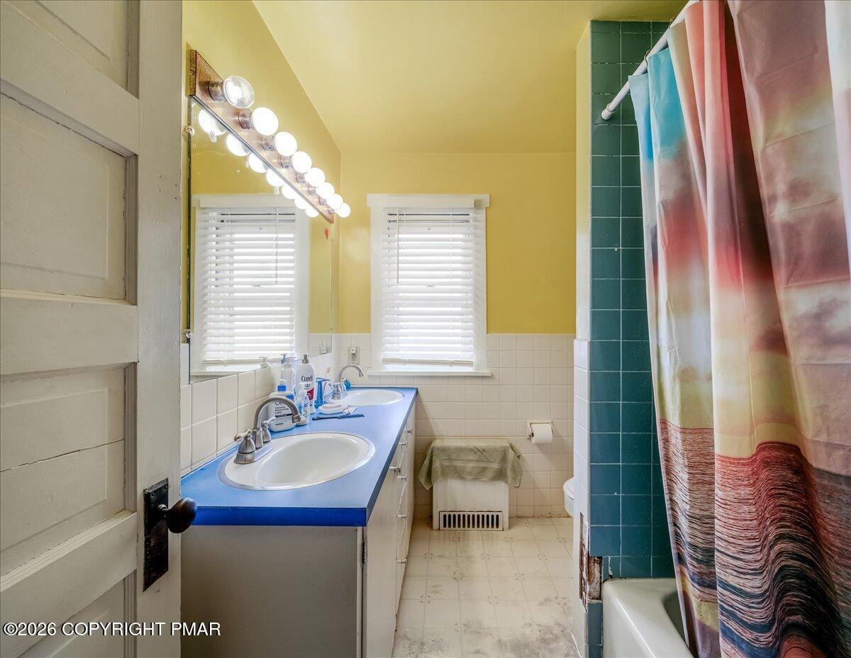 136 St George Street Lewisburg, PA 17837 - Photo 20 of 42 a bathroom with a sink and a mirror