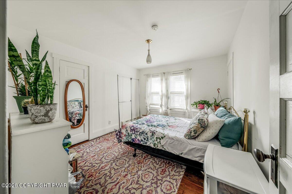 136 St George Street Lewisburg, PA 17837 - Photo 24 of 42 a bedroom with a bed and a large window