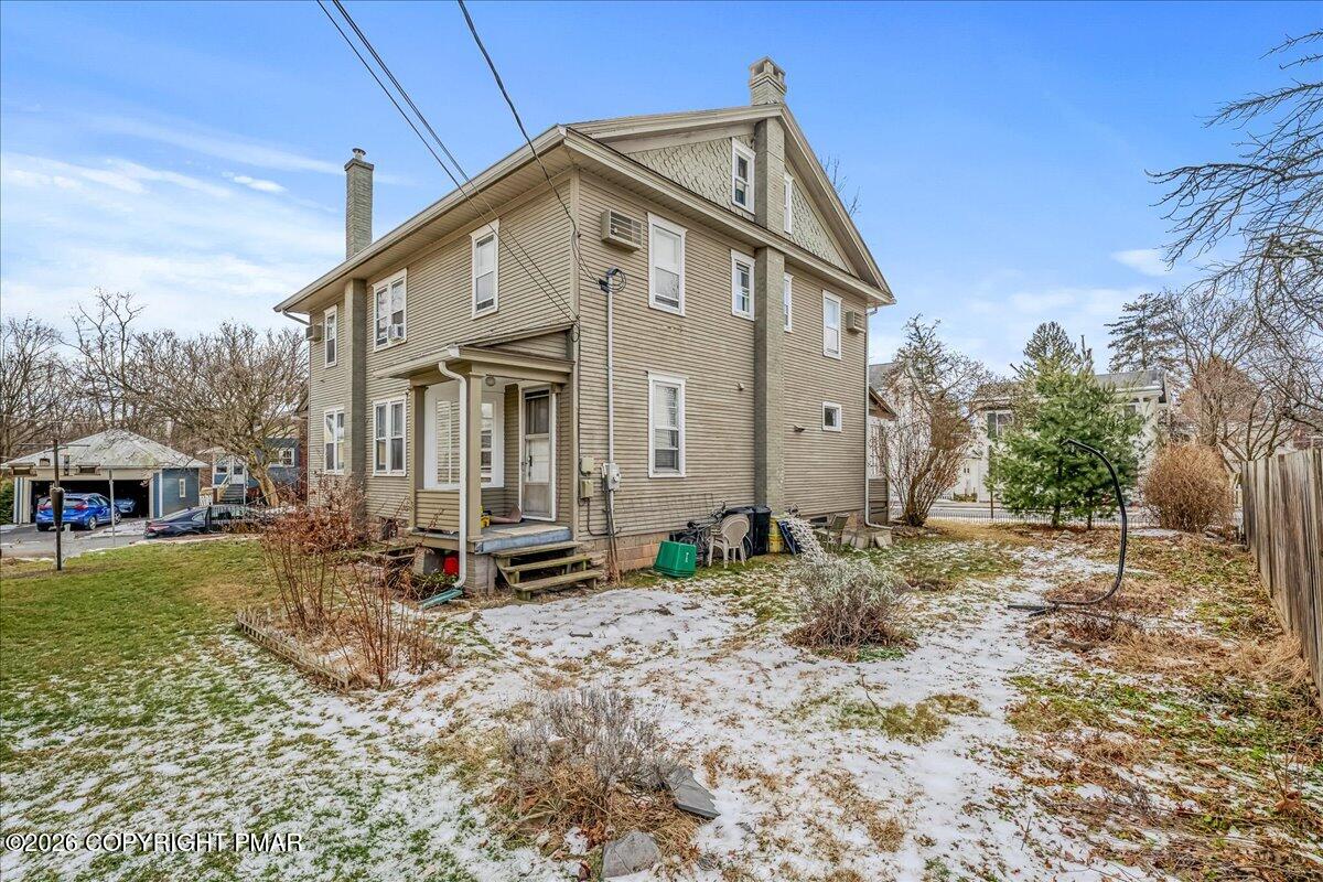136 St George Street Lewisburg, PA 17837 - Photo 37 of 42 a front view of a house with garden