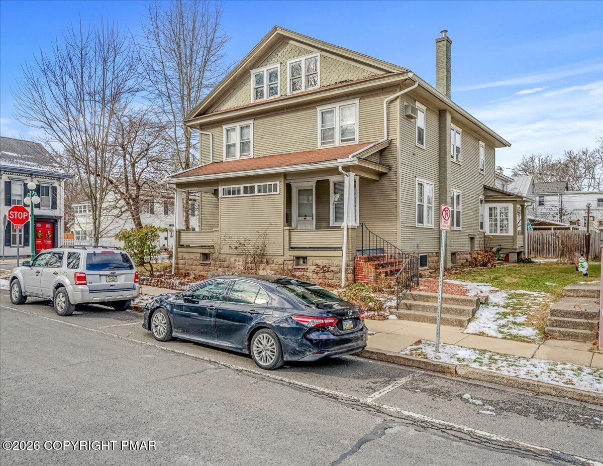 136 St George Street Lewisburg, PA 17837 - Photo 38 of 42 a car parked in front of a house