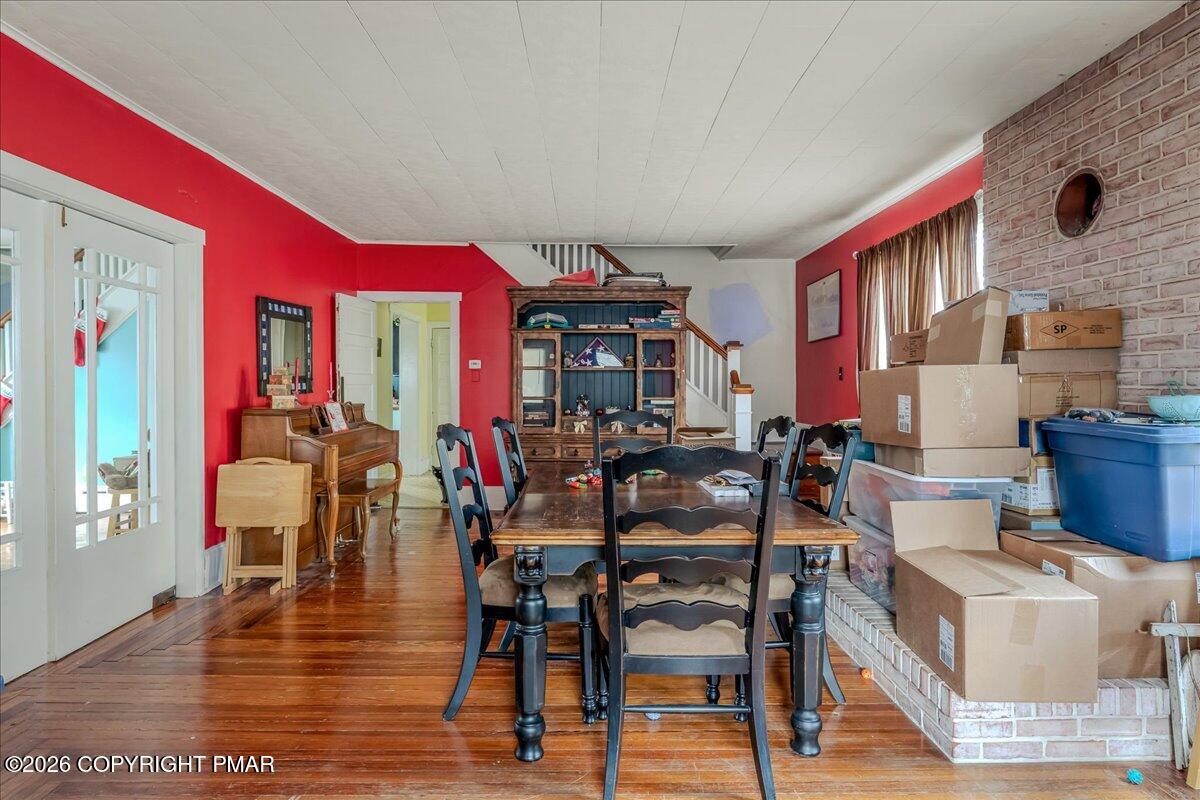 136 St George Street Lewisburg, PA 17837 - Photo 5 of 42 a view of a dining room with furniture and wooden floor