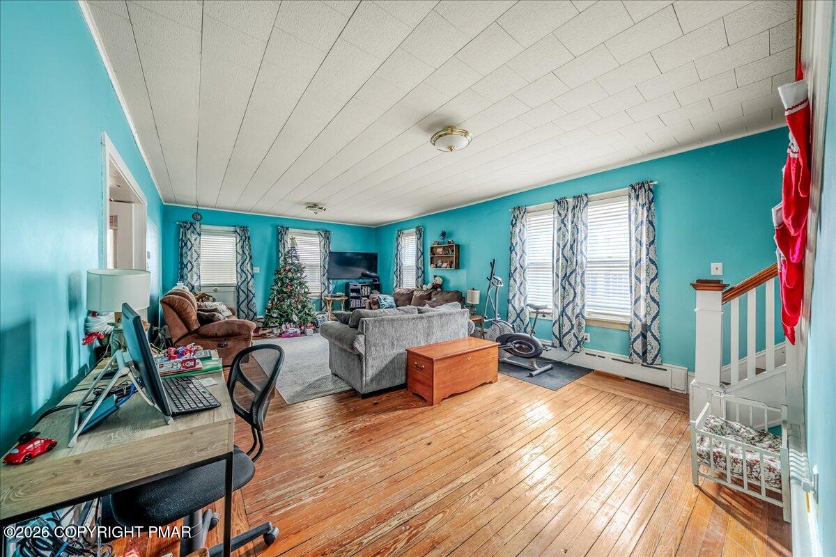 136 St George Street Lewisburg, PA 17837 - Photo 10 of 42 a living room with furniture and a wooden floor