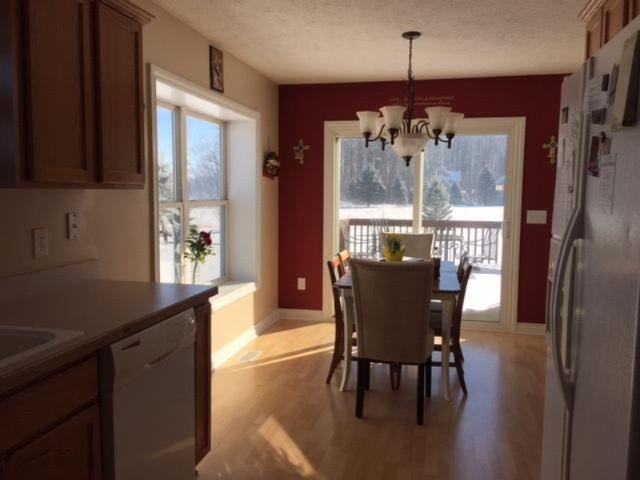 9949 Peake Road Portland, MI 48875 - Photo 6 of 30 kitchen-dining