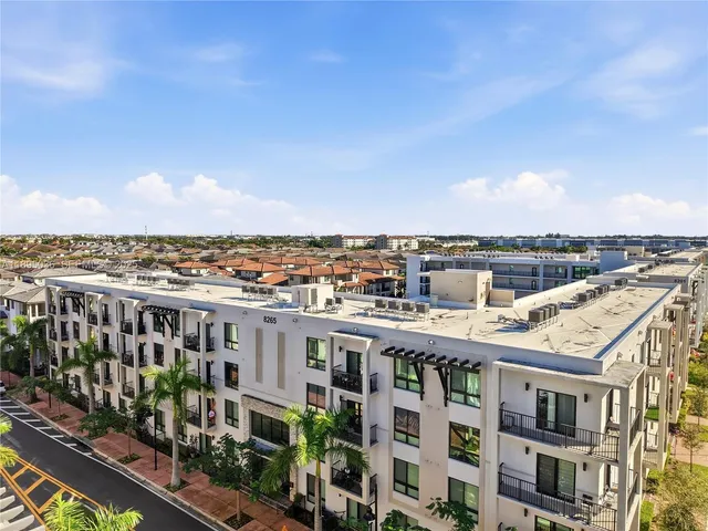 a view of city with tall buildings