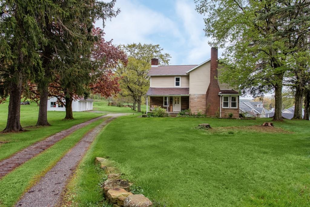 246 Forsythe Road Valencia, PA 16059 - Photo 1 of 23 a view of a house with a yard