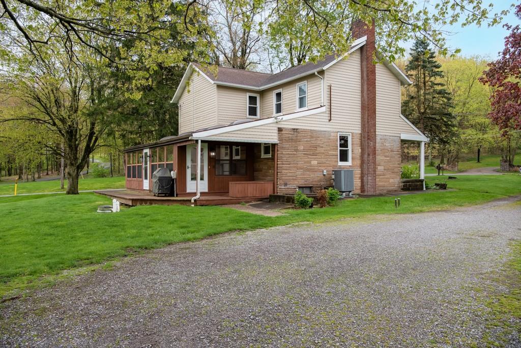 246 Forsythe Road Valencia, PA 16059 - Photo 3 of 23 a view of a house with a yard and large tree