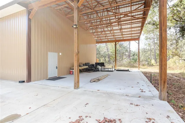 a view of a yard covered with snow