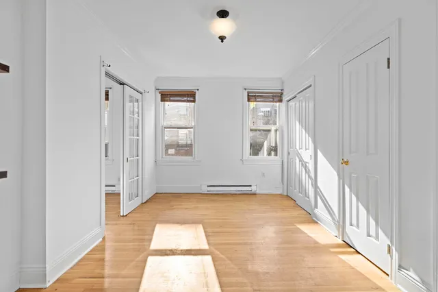 a view of an empty room with stairs