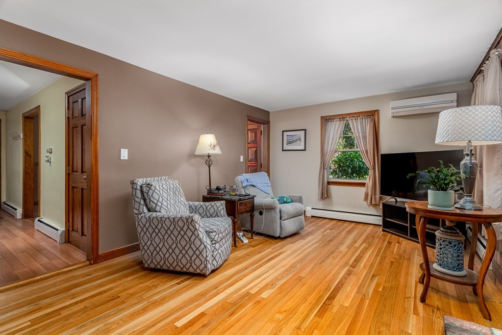2 Victor Drive Ayer, MA 01432 - Photo 13 of 42 a living room with furniture and a flat screen tv