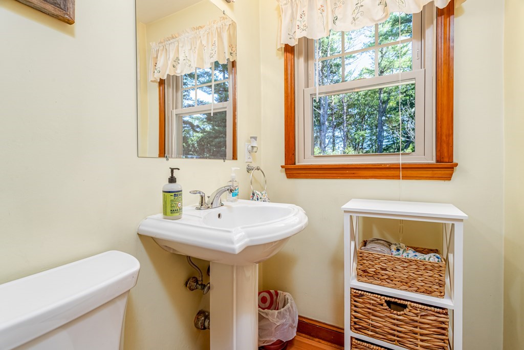 2 Victor Drive Ayer, MA 01432 - Photo 18 of 42 a bathroom with a sink a toilet and a mirror