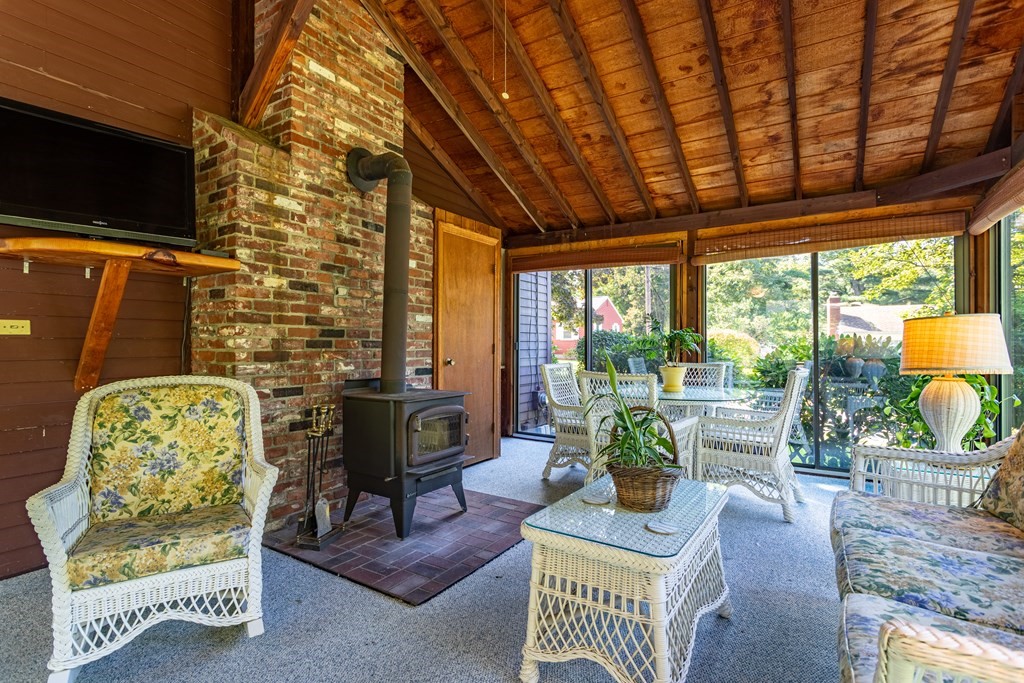 2 Victor Drive Ayer, MA 01432 - Photo 20 of 42 a living room with furniture and a flat screen tv