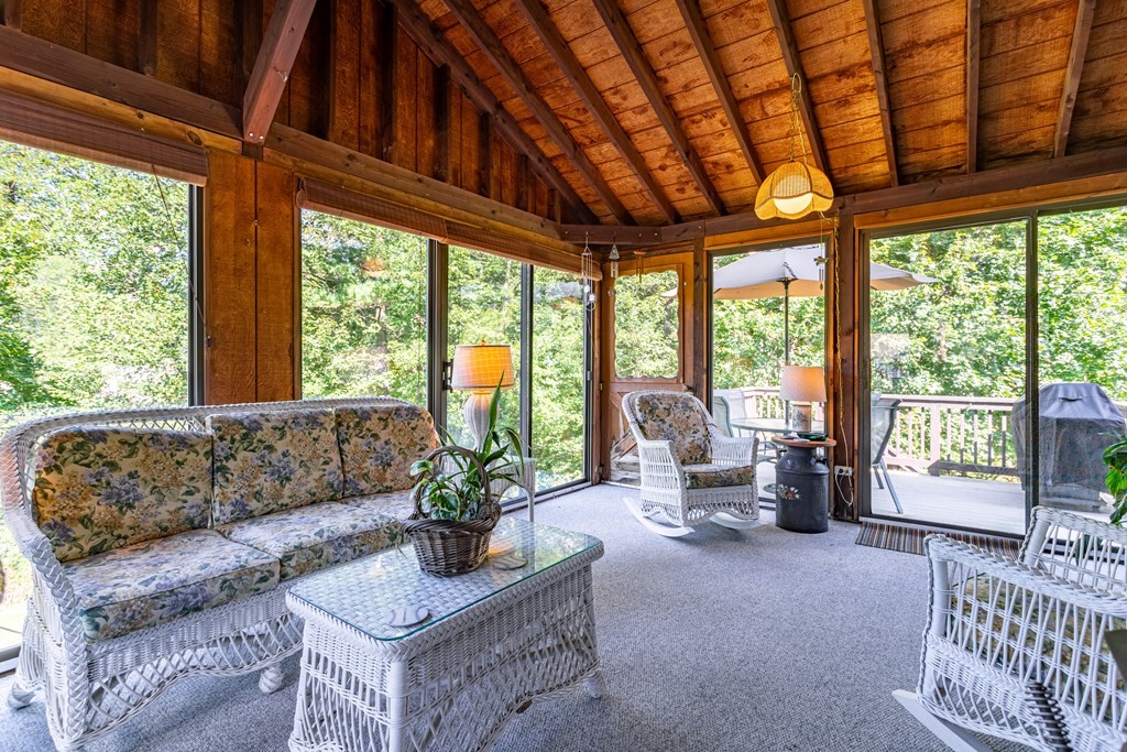 2 Victor Drive Ayer, MA 01432 - Photo 22 of 42 a living room with furniture and floor to ceiling windows