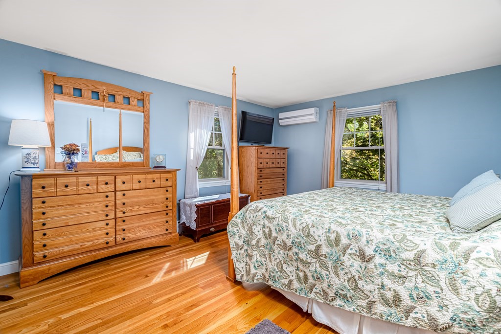 2 Victor Drive Ayer, MA 01432 - Photo 23 of 42 a bedroom with a bed and a dresser