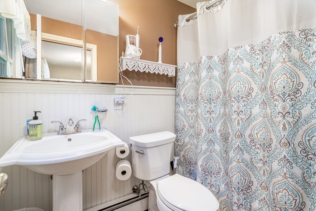 2 Victor Drive Ayer, MA 01432 - Photo 27 of 42 a bathroom with a sink a toilet and a mirror