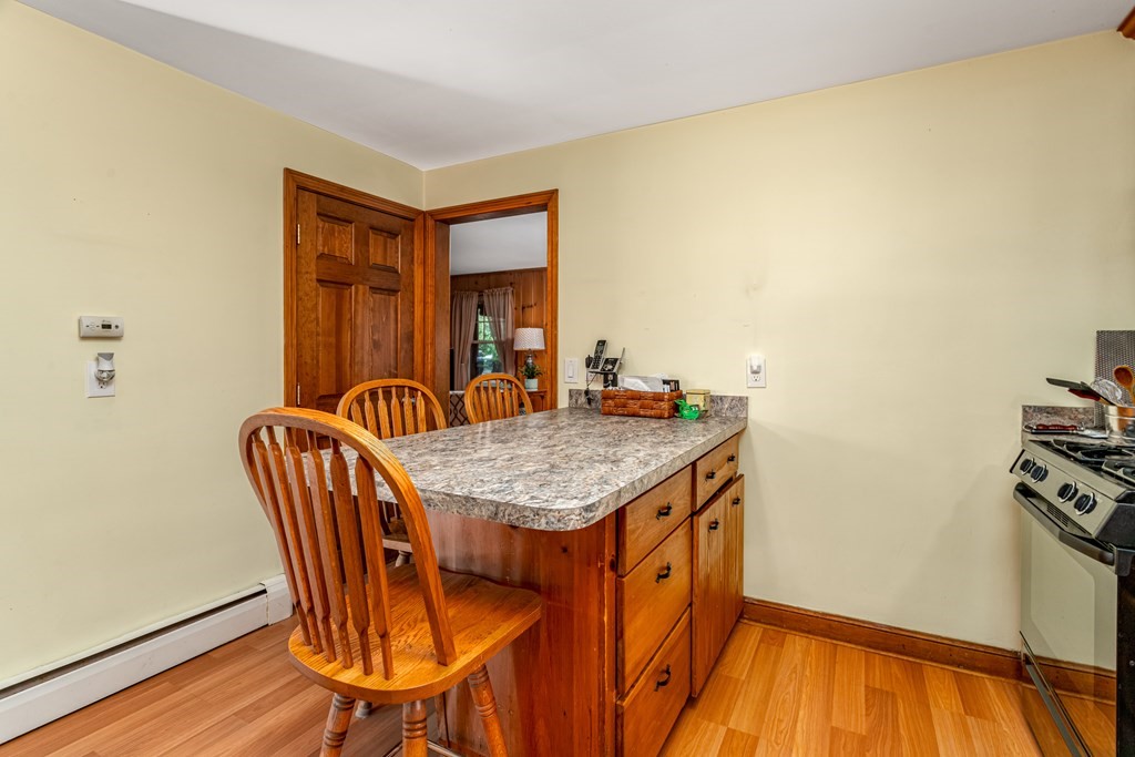 2 Victor Drive Ayer, MA 01432 - Photo 10 of 42 a dining room with furniture and wooden floor