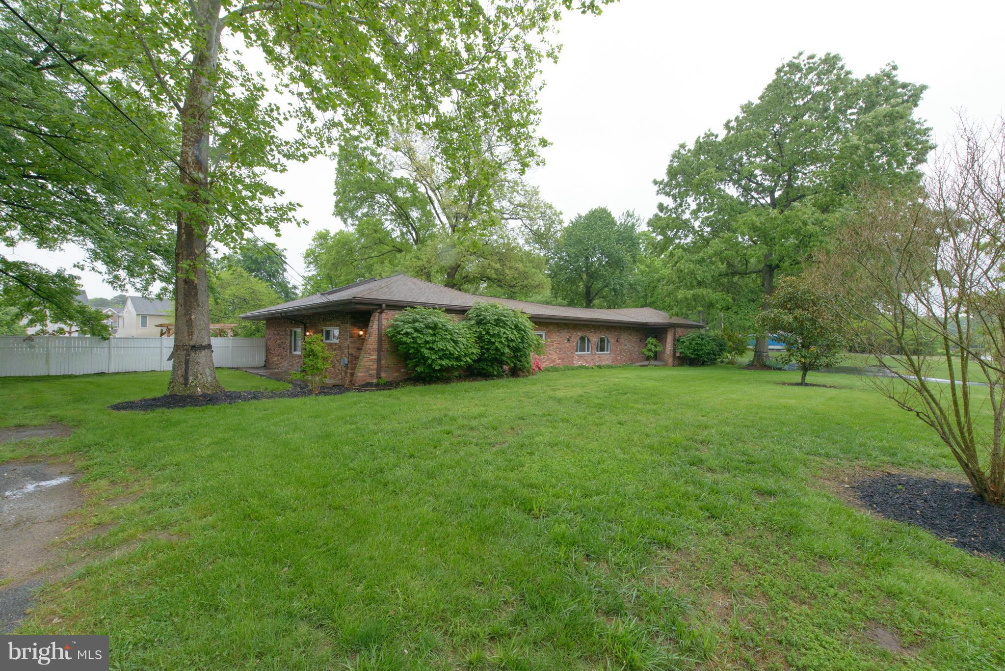 8213 WB&A Road Severn, MD 21144 - Photo 3 of 30 a view of a house with backyard and garden