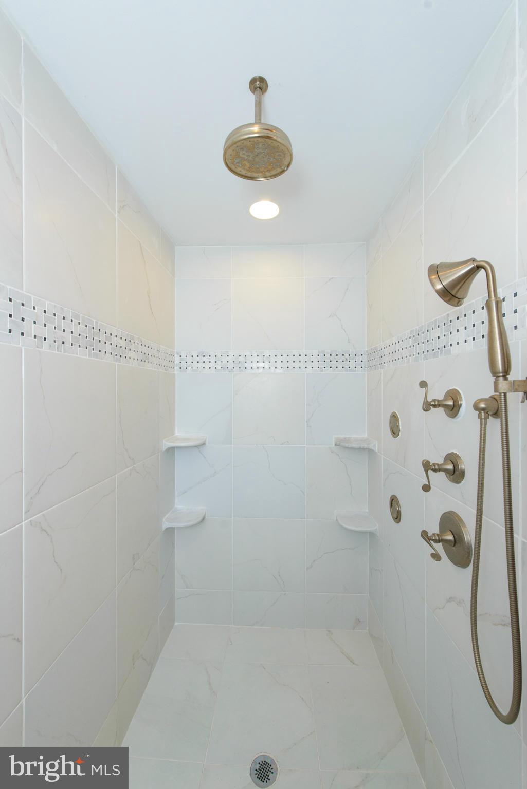 8213 WB&A Road Severn, MD 21144 - Photo 25 of 30 a bathroom with a shower