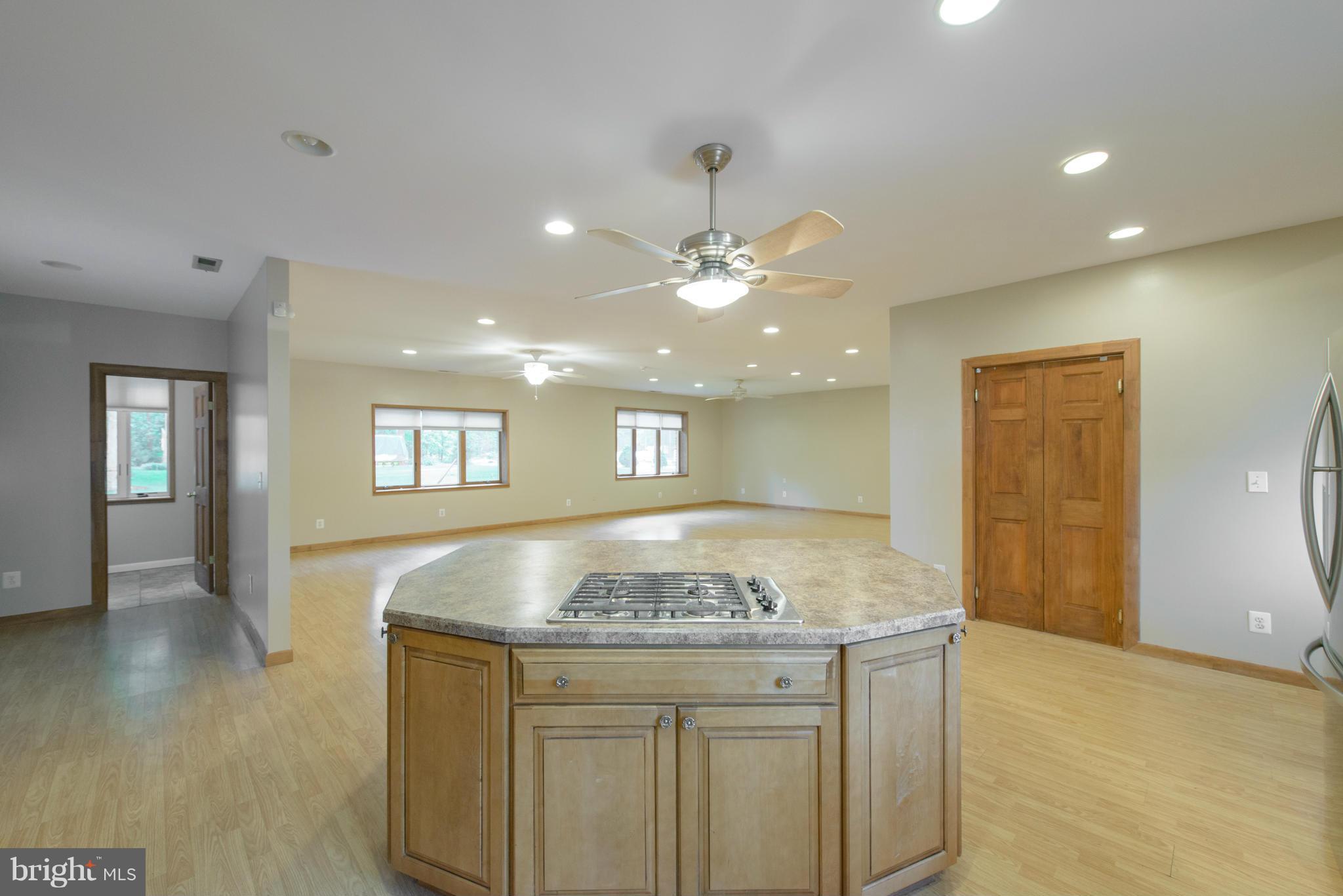 8213 WB&A Road Severn, MD 21144 - Photo 7 of 30 a view of kitchen island a sink and dishwasher