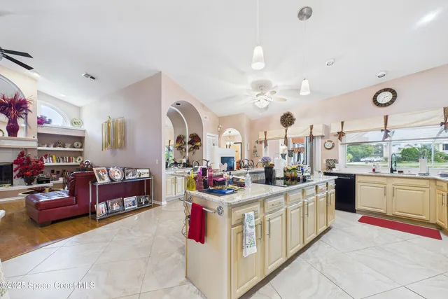 a kitchen with lots of counter top space and appliances