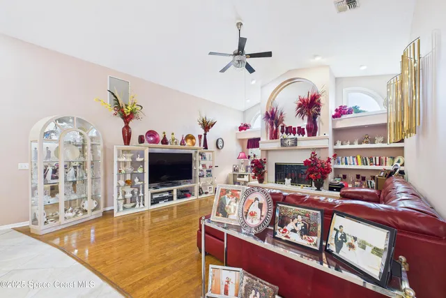 a bedroom with a bed dresser and a window