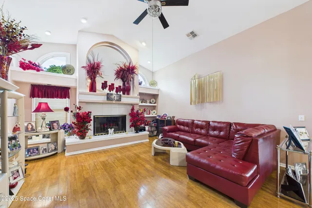 a bathroom with a sink vanity mirror and toilet