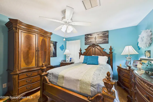 a view of a backyard with a patio and a garden