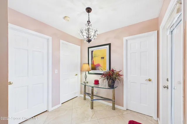 an aerial view of a house with a garden fire pit