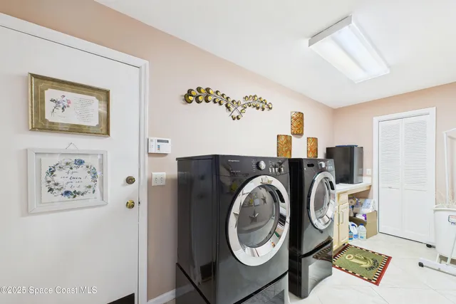 an aerial view of house with yard swimming pool and outdoor seating