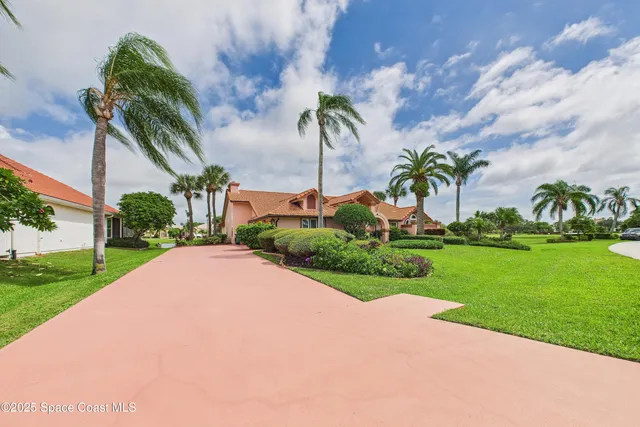 an aerial view of a houses with outdoor space