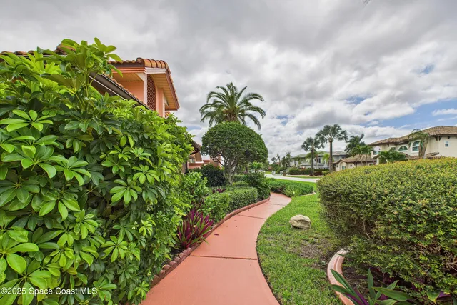 an aerial view of a golf course with ocean view