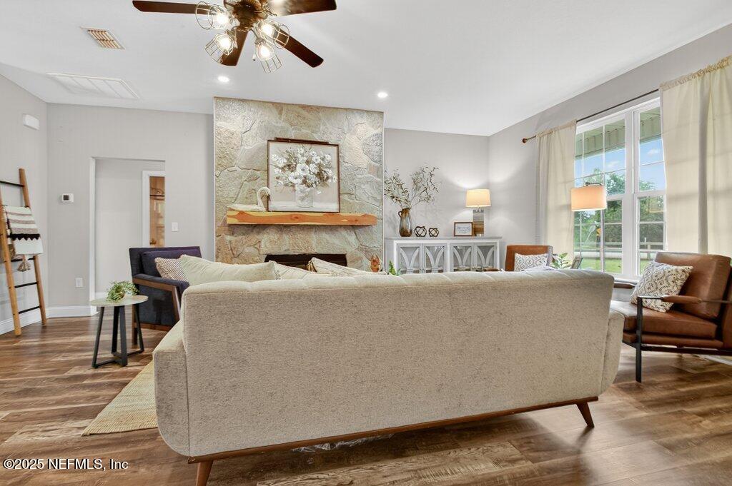 204 Comer Road Palatka, FL 32177 - Photo 11 of 61 a living room with furniture and a large window