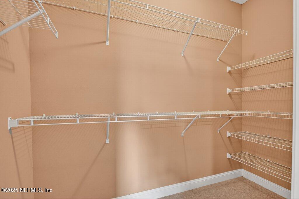 204 Comer Road Palatka, FL 32177 - Photo 26 of 61 a view of a room with racks on the wall