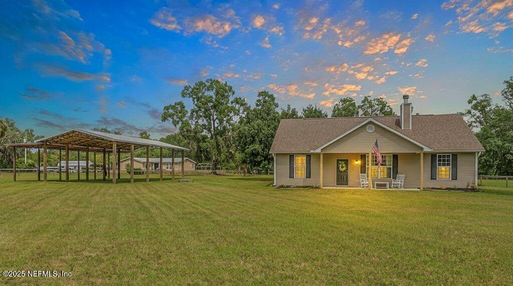 204 Comer Road Palatka, FL 32177 - Photo 3 of 61 a view of a house with a big yard