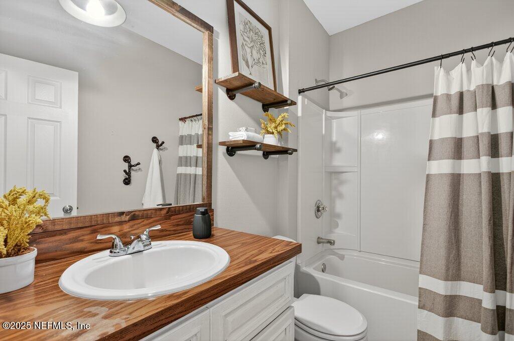 204 Comer Road Palatka, FL 32177 - Photo 33 of 61 a bathroom with a sink toilet and shower