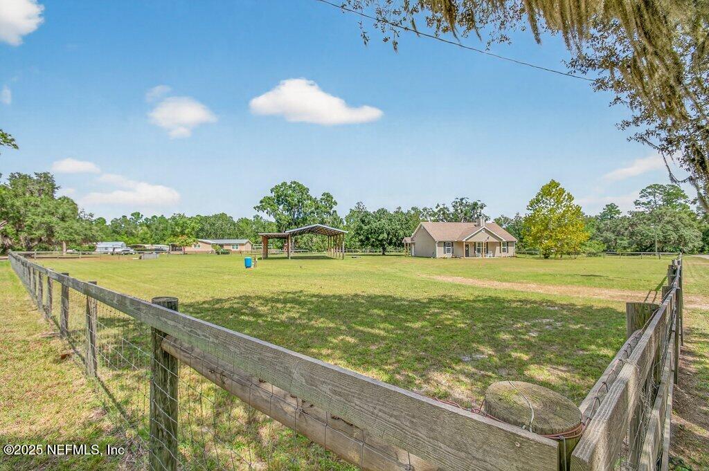 204 Comer Road Palatka, FL 32177 - Photo 47 of 61 a view of a lake from a balcony