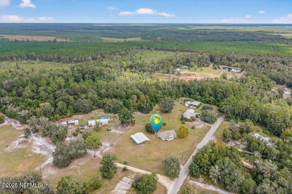 204 Comer Road Palatka, FL 32177 - Photo 55 of 61 a view of a lake with a mountain