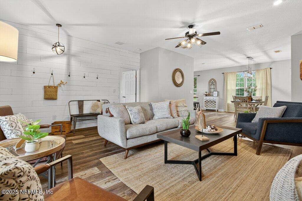 204 Comer Road Palatka, FL 32177 - Photo 10 of 61 a living room with furniture and a large window