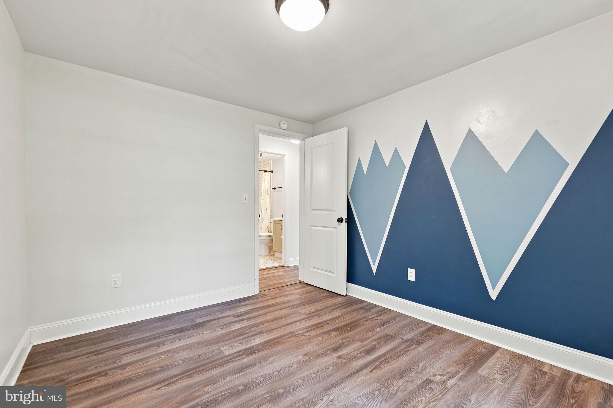 306 Fegan Road Bunker Hill, WV 25413 - Photo 40 of 54 Charming room with mountain mural.