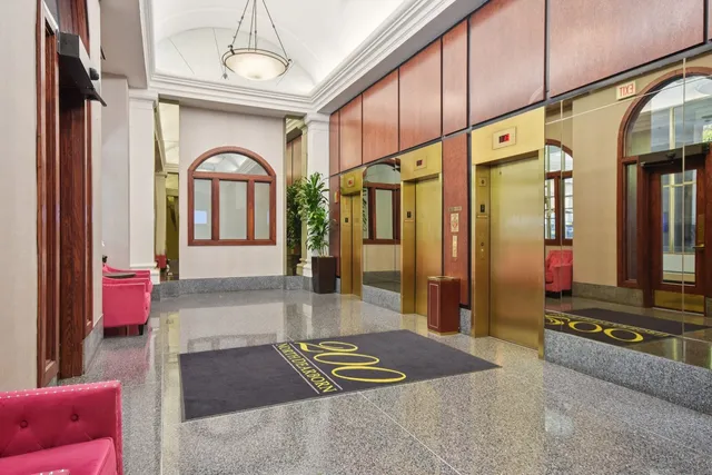 a view of front door with outdoor seating