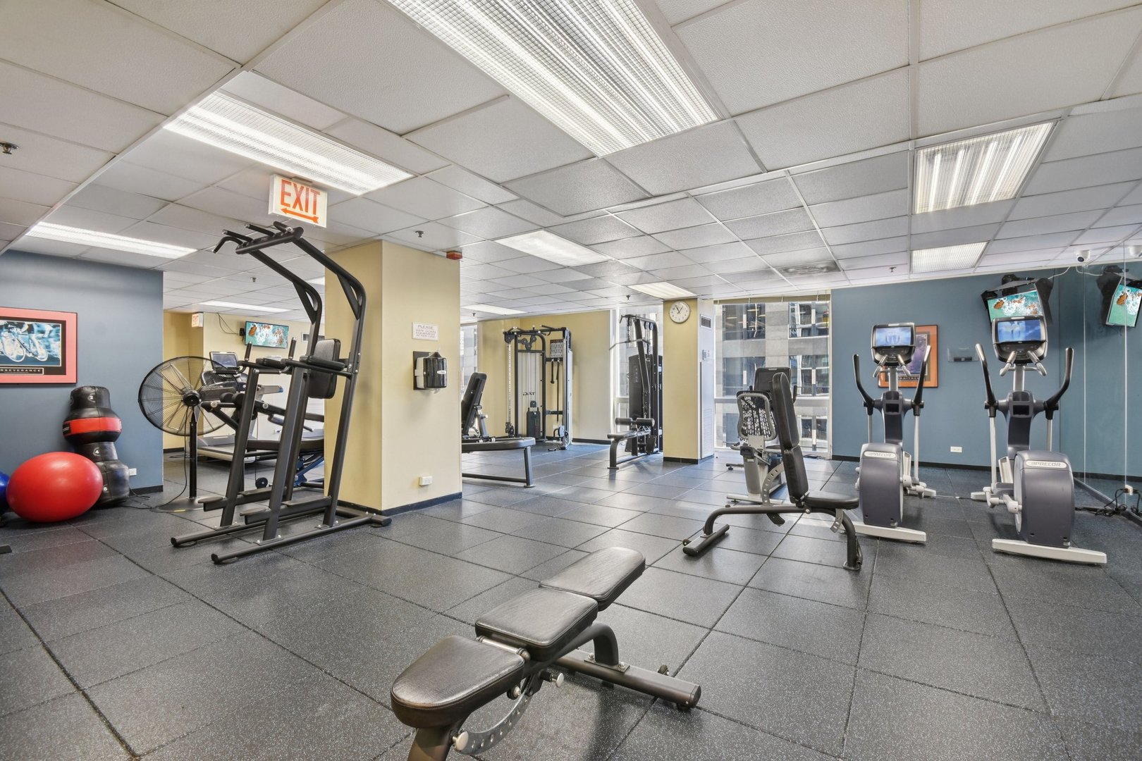 200 North Dearborn Street, Unit 1303 Chicago, IL 60601 - Photo 23 of 32 a view of a room with gym equipment